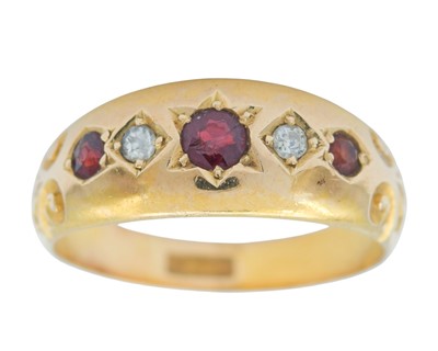 Lot 19 - A Victorian 18k diamond and garnet set five-stone gypsy ring.