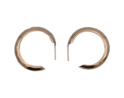 Lot 76 - A pair of 9k hallmarked gold scroll-engraved hoop earrings.