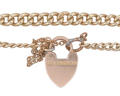 Lot 12 - A 9k curb-link bracelet with padlock clasp.