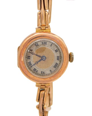 Lot 706 - A 1920's 9k rose-gold cased lady's wristwatch with 9k rose-gold expanding bracelet.