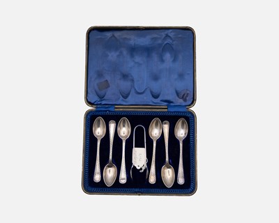 Lot 170 - A cased set of George V silver teaspoons and a pair of sugar tongs by Joseph Rodgers & Sons.