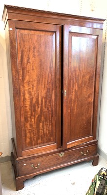 Lot 3234 - A late George III mahogany wardrobe, with...