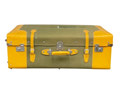 Lot 130 - A large canvas and vinyl covered travel trunk.