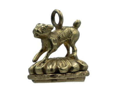 Lot 565 - A modern 9k fob seal cast with a pug dog, chrysoprase matrix.