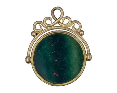 Lot 590 - A 9k bloodstone set swivel watch fob.