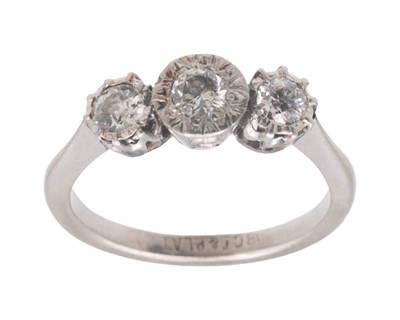 Lot 93 - An 18k white gold and platinum diamond set three-stone ring.