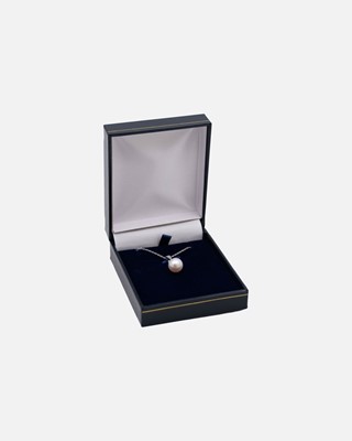 Lot 44 - A 9k white gold diamond and cultured pearl set pendant, on a 9k white gold necklace.