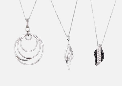 Lot 10 - Three silver pendant necklaces.