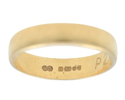 Lot 11 - A 22k hallmarked gold D-section band ring.