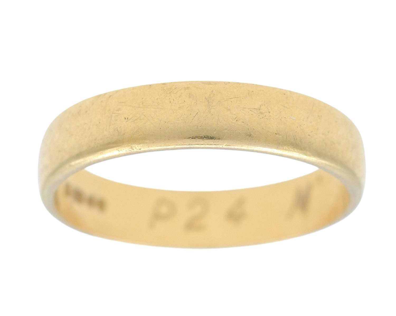 Lot 11 - A 22k hallmarked gold D-section band ring.