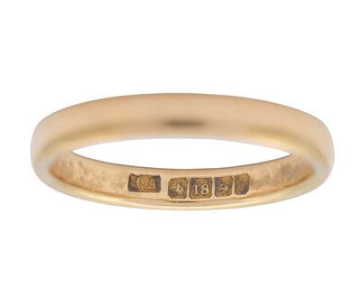 Lot 17 - An 18k hallmarked gold band ring.