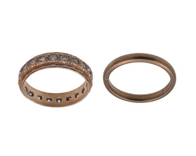 Lot 30 - A 9k band ring, and a 9k white spinel set eternity ring.