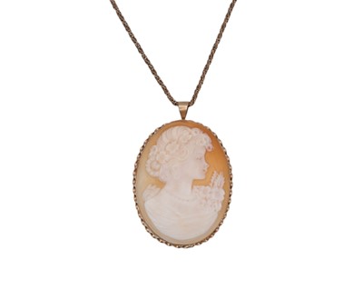 Lot 40 - A 9k mounted shell cameo pendant, on a 9k rope twist neck chain.