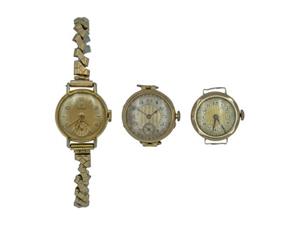Lot 692 - A selection of three ladies' manual wind wristwatches, two in 9k cases.
