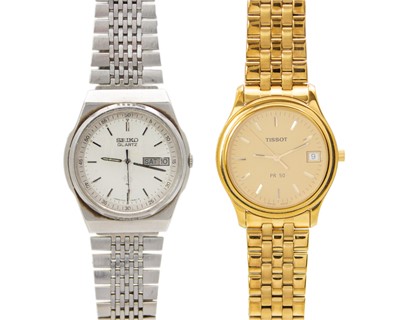 Lot 693 - SEIKO & TISSOT - Two gentleman's quartz bracelet wristwatches.