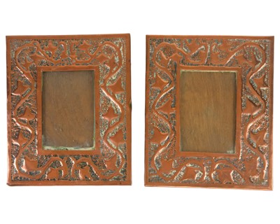 Lot 142 - A pair of Arts and Crafts copper photograph frames.
