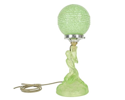Lot 147 - An Art Deco green glass table lamp.