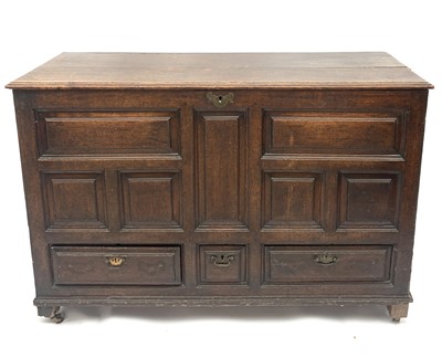 Lot 3129 - A George III oak mule chest, the front with...