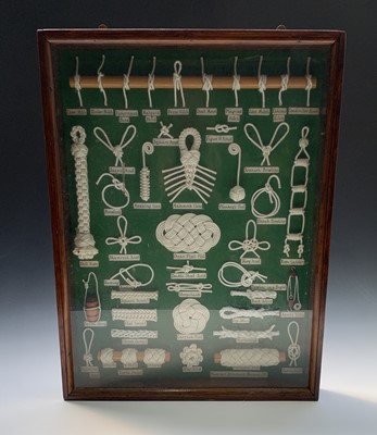 Lot 26 - A knot board displaying an arrangement of 42...