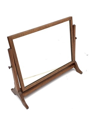Lot 3201 - An Arts and Crafts oak swing dressing table...