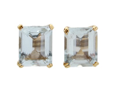 Lot 20 - A pair of good emerald-cut large aquamarine stud earrings, set in 18k gold.
