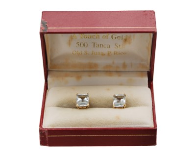 Lot 20 - A pair of good emerald-cut large aquamarine stud earrings, set in 18k gold.