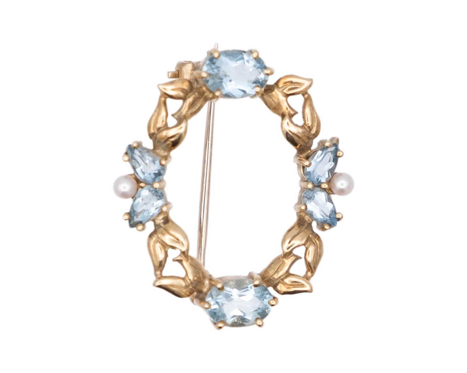 Lot 15 - CROP & FARR - A 9k hallmarked gold aquamarine and cultured seed pearl set annular brooch.