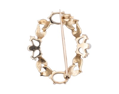 Lot 15 - CROP & FARR - A 9k hallmarked gold aquamarine and cultured seed pearl set annular brooch.