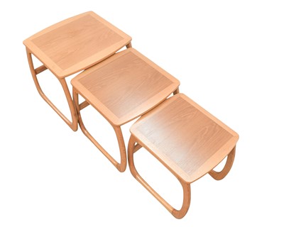 Lot 10 - A nest of three Nathan teak occasional tables.