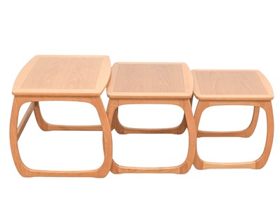 Lot 10 - A nest of three Nathan teak occasional tables.