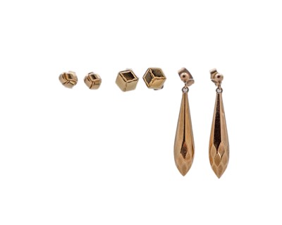 Lot 112 - A 9k pair of torpedo drop earrings, and two pairs of 9k stud earrings.