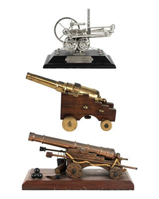 Lot 131 - A bronze model cannon.