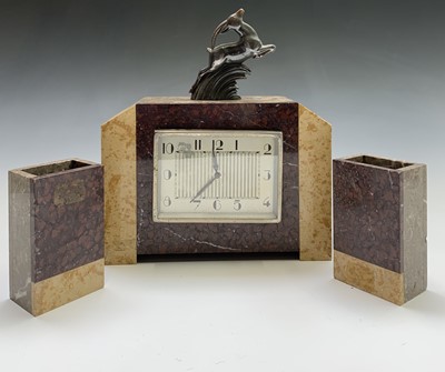 Lot 2910 - An Art Deco French marble three piece clock...