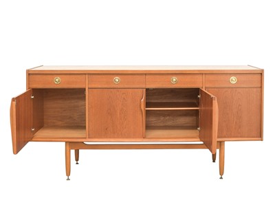 Lot 43 - A teak sideboard.