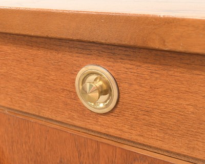 Lot 43 - A teak sideboard.