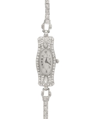 Lot 710 - An Art Deco platinum cocktail bracelet watch, set with diamonds, with replacement quartz movement.