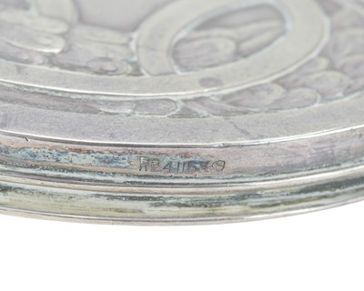 Lot 50 - Kate Harris for William Hutton & Sons, an Art Nouveau silver hand mirror.