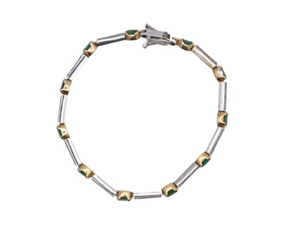 Lot 56 - An emerald and diamond set bracelet, in yellow and white gold.