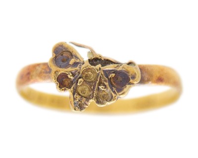 Lot 149 - A Victorian 22k hallmarked gold ring applied with a butterfly.