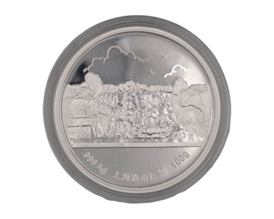 Lot 3 - A Chinese Shanghai Mint .999 fine silver and gold-plated 100g medallion.