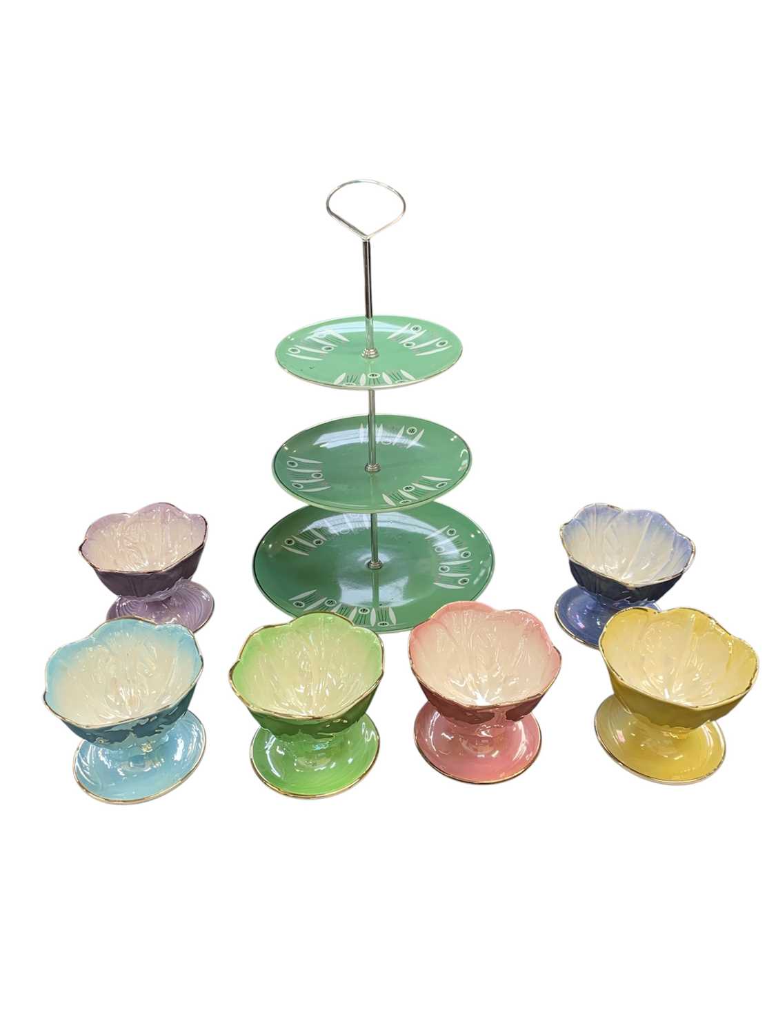 Lot 33 - A set of six harlequin Maling dessert dishes.
