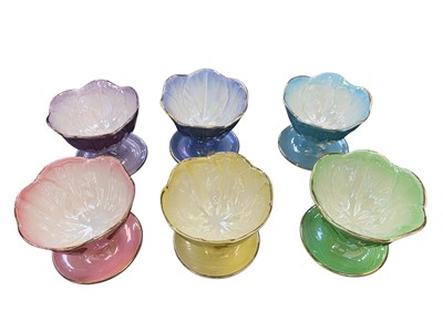 Lot 33 - A set of six harlequin Maling dessert dishes.