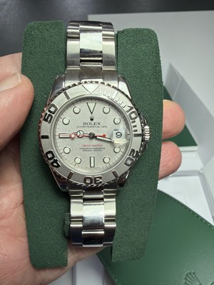 Lot 658 - ROLEX - A fine Yacht-Master platinum and steel gentleman's mid-size bracelet wristwatch.