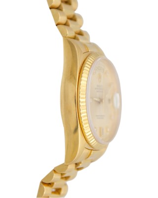 Lot 657 - ROLEX - A fine 18k Oyster Perpetual Day-Date gentleman's bracelet wristwatch with diamond set dial.