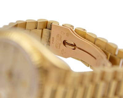 Lot 657 - ROLEX - A fine 18k Oyster Perpetual Day-Date gentleman's bracelet wristwatch with diamond set dial.