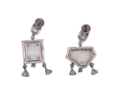 Lot 165 - A fine pair of 18k (tested) white gold, white zircon and diamond set cluster drop earrings.