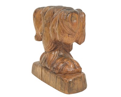 Lot 40 - A carved oak candelabrum.