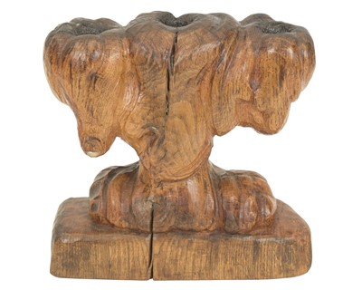Lot 40 - A carved oak candelabrum.