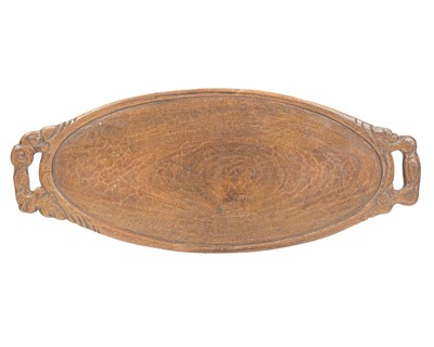 Lot 39 - A carved walnut oval tray.