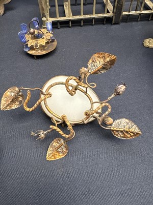 Lot 23 - A gilt metal double photograph frame.